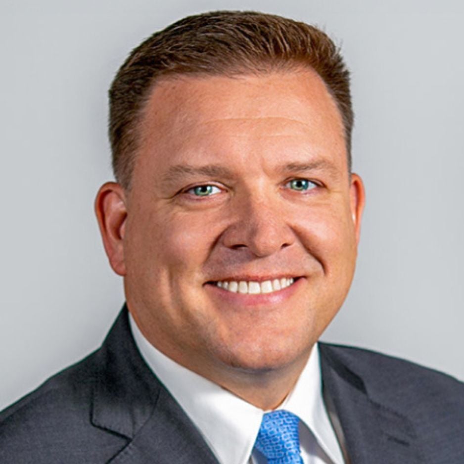 Scott-Mahoney-headshot-gray-bkg